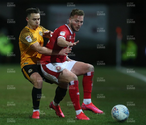 110220 - Newport County v Walsall - SkyBet League Two - Cameron Norman of Walsall is tackled by Billy Waters of Newport County