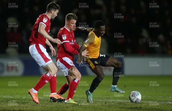 110220 - Newport County v Walsall - SkyBet League Two - Ryan Haynes of Newport County is tackled by Cameron Pring of Walsall