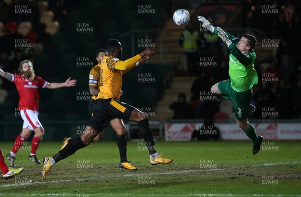 110220 - Newport County v Walsall - SkyBet League Two - Jamille Matt of Newport County can't get to the ball before keeper Liam Roberts of Walsall