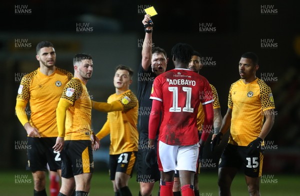 110220 - Newport County v Walsall - SkyBet League Two - Elijah Adebayo of Walsall is given a yellow card by referee Brett Huxtable