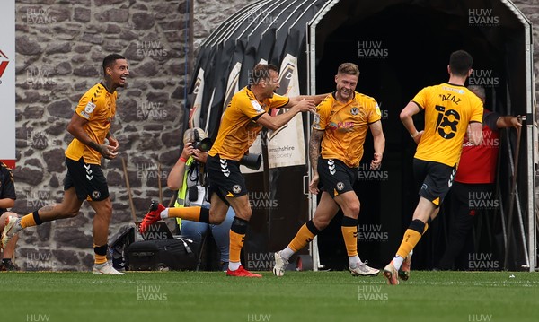 180921 - Newport County v Walsall - SkyBet League Two - James Clarke of Newport County celebrates scoring a goal with team mates