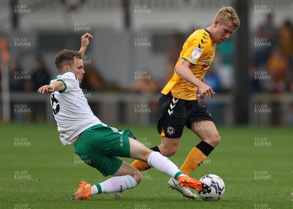 180921 - Newport County v Walsall - SkyBet League Two - Ollie Cooper of Newport County is tackled by Liam Kinsella of Walsall