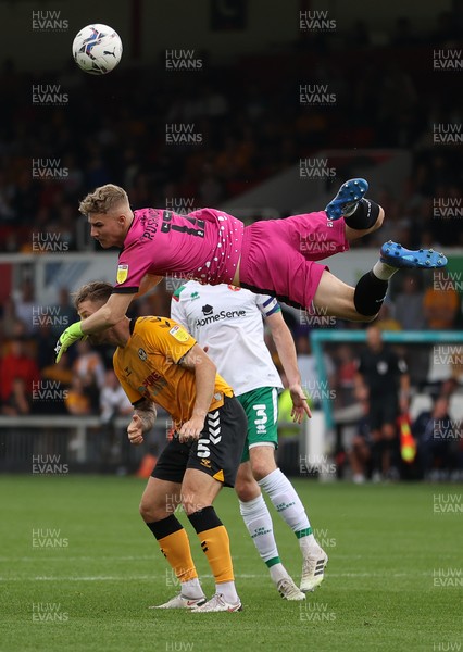 180921 - Newport County v Walsall - SkyBet League Two - Keeper Carl Rushworth of Walsall collides with James Clarke of Newport County