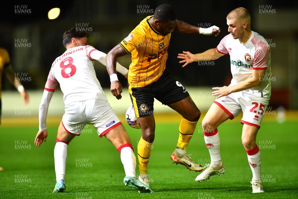 201023 - Newport County v Walsall - EFL SkyBet League 2 - Omar Bogle of Newport County is tackled by Isaac Hutchinson and Ryan Stirk of Walsall