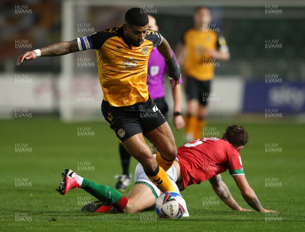 241120 - Newport County v Walsall - SkyBet League Two -  Joss Labadie of Newport County is challenged by Dan Scarr of Walsall