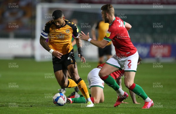 241120 - Newport County v Walsall - SkyBet League Two - Joss Labadie of Newport County is challenged by Cameron Norman of Walsall