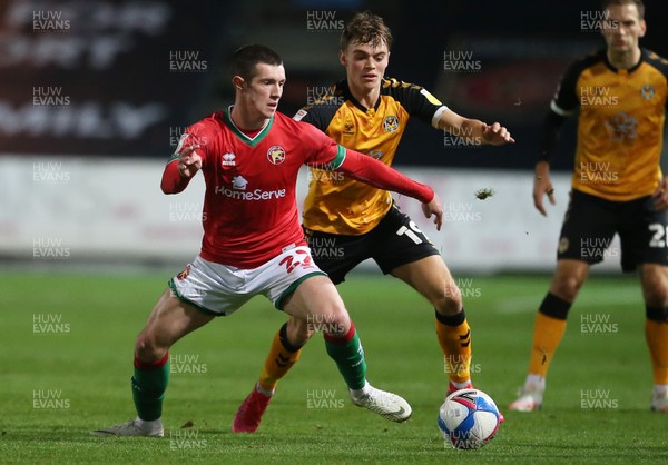 241120 - Newport County v Walsall - SkyBet League Two - Rory Holden of Walsall is challenged by Scott Twine of Newport County