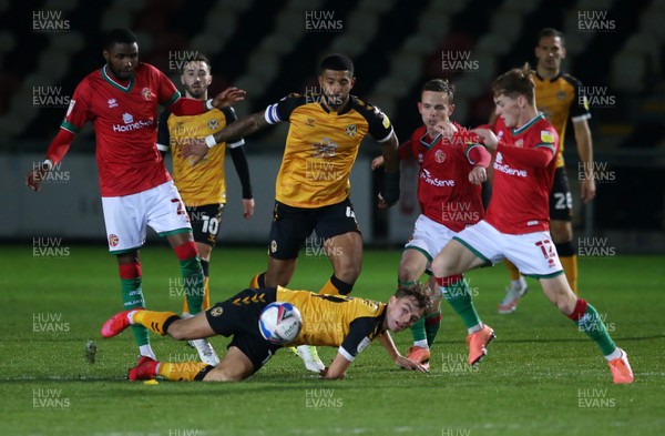 241120 - Newport County v Walsall - SkyBet League Two - Scott Twine of Newport County goes down in front of the ball