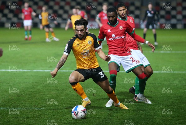 241120 - Newport County v Walsall - SkyBet League Two - Liam Shephard of Newport County gets to the ball