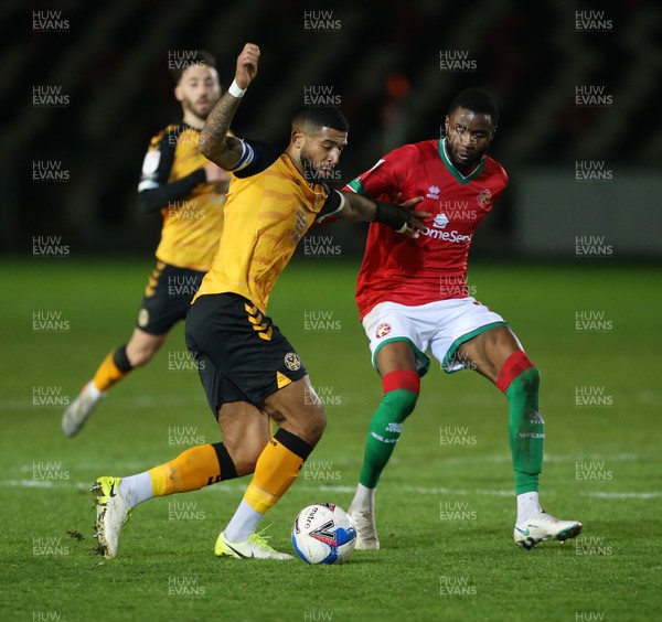 241120 - Newport County v Walsall - SkyBet League Two - Joss Labadie of Newport County is challenged by Emmanuel Osadebe of Walsall