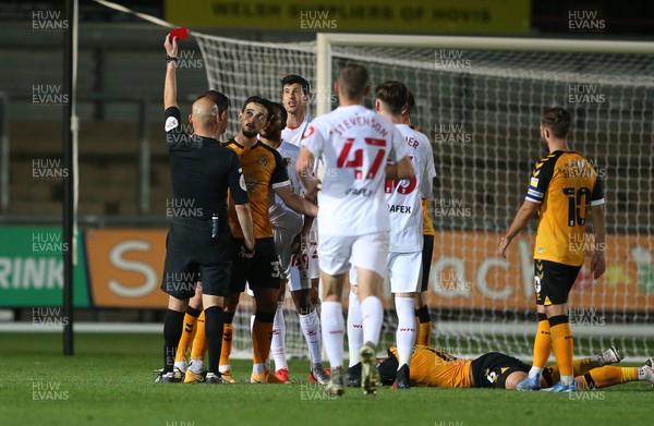 220920 - Newport County v Watford - Carabao Cup - Stipe Perica of Watford is shown a red card from referee Charles Breakspear for his tackle on Brandon Cooper of Newport County