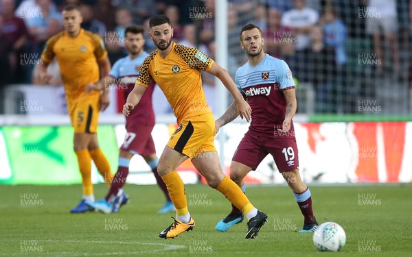 270819 - Newport County v West Ham United - Carabao Cup - Padraig Amond of Newport County and Jack Wilshere of West Ham