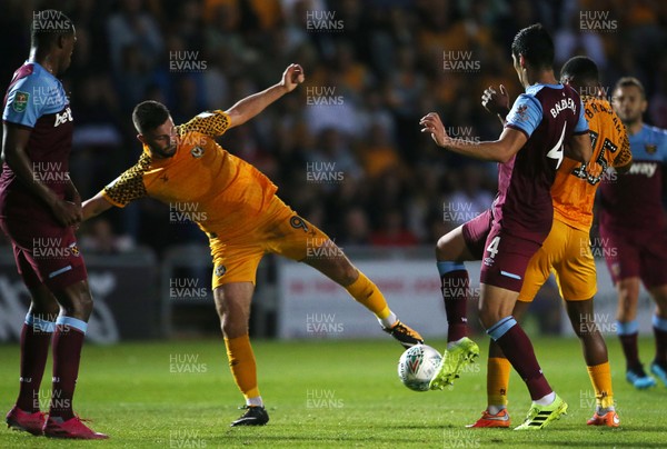 270819 - Newport County v West Ham United - Carabao Cup - Padraig Amond of Newport County tries to get a shot at goal