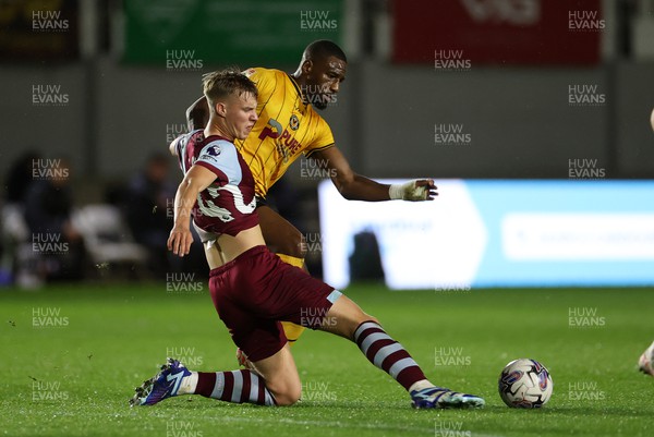 311023 - Newport County v West Ham United U21s - Carabao Cup - Kaelan Casey of West Ham is challenged by Omar Bogle of Newport County 