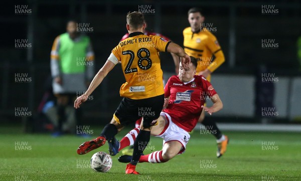 111218 - Newport County v Wrexham AFC - FA Cup Second Round Replay - Mickey Demetriou of Newport County is tackled by Luke Young of Wrexham who is given a red card