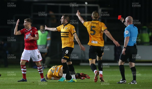 111218 - Newport County v Wrexham AFC - FA Cup Second Round Replay - Dejected Luke Young of Wrexham as referee Kevin Johnson gives him a red card