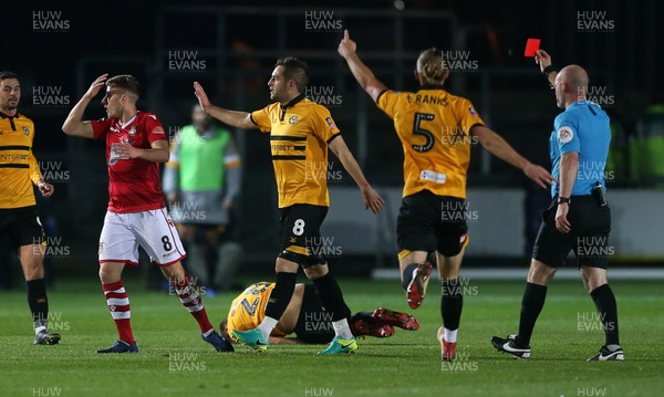 111218 - Newport County v Wrexham AFC - FA Cup Second Round Replay - Dejected Luke Young of Wrexham as referee Kevin Johnson gives him a red card