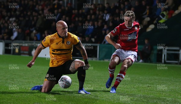 111218 - Newport County v Wrexham AFC - FA Cup Second Round Replay - Paul Rutherford of Wrexham has his cross blocked by David Pipe of Newport County