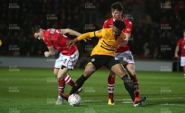 111218 - Newport County v Wrexham AFC - FA Cup Second Round Replay - Antoine Semenyo of Newport County is challenged by James Jennings of Wrexham