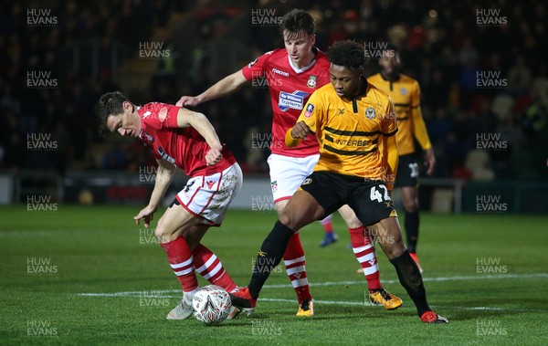 111218 - Newport County v Wrexham AFC - FA Cup Second Round Replay - Antoine Semenyo of Newport County is challenged by James Jennings of Wrexham