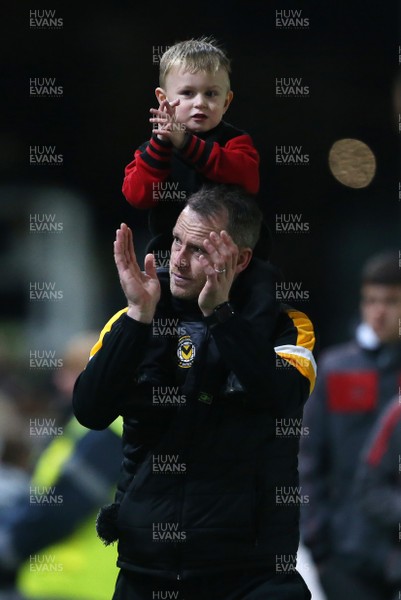 111218 - Newport County v Wrexham AFC - FA Cup Second Round Replay - Newport County Manager Michael Flynn with his son on his shoulders at full time