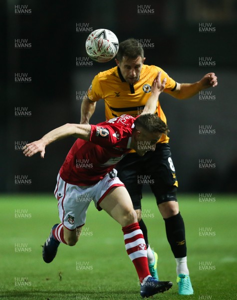 111218 - Newport County v Wrexham, FA Cup Round 2 Replay - Luke Young of Wrexham and Matt Dolan of Newport County compete for the ball
