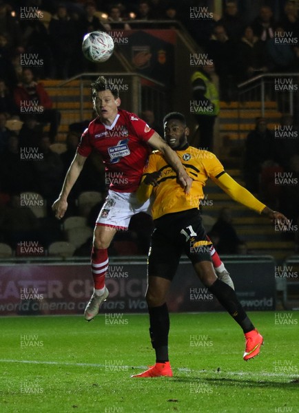 111218 - Newport County v Wrexham, FA Cup Round 2 Replay - Jamille Matt of Newport County and James Jennings of Wrexham compete for the ball