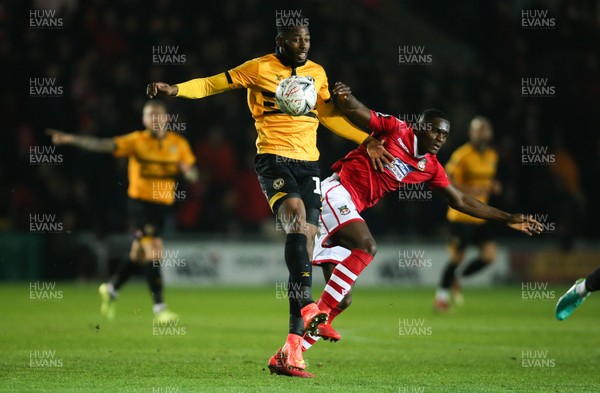 111218 - Newport County v Wrexham, FA Cup Round 2 Replay - Jamille Matt of Newport County and Akil Wright of Wrexham compete for the ball