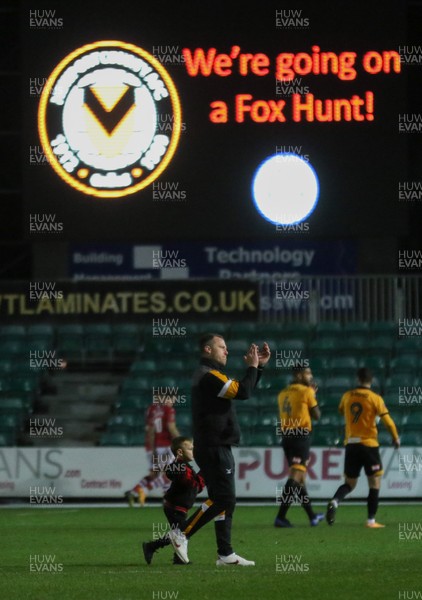 111218 - Newport County v Wrexham, FA Cup Round 2 Replay - The scoreboard at Newport County highlights the next opponents for the club in the FA Cup, Leicester City, after beating Wrexham, as Newport County manager Michael Flynn leaves the pitch