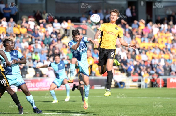 090917 - Newport County v Wycombe Wanderers - SkyBet League 2 - Ben White of Newport County heads a shot at goal