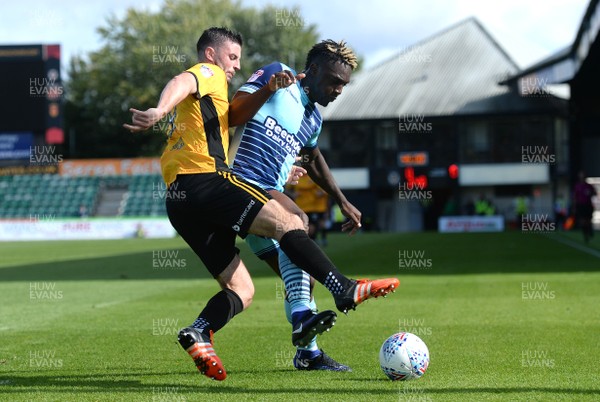 090917 - Newport County v Wycombe Wanderers - SkyBet League 2 - Padraig Amond of Newport County and Anthony Stewart of Wycombe Wanderers compete