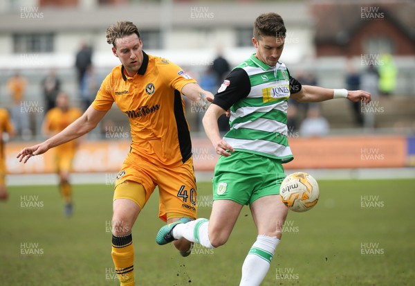 140417 - Newport County v Yeovil Town, Sky Bet League 2 - Ryan Bird of Newport County puts Alex Lacey of Yeovil under pressure