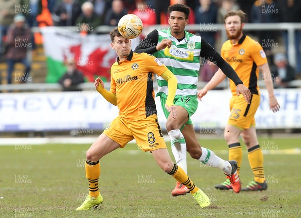 140417 - Newport County v Yeovil Town, Sky Bet League 2 - Mark Randall of Newport County heads the ball forward