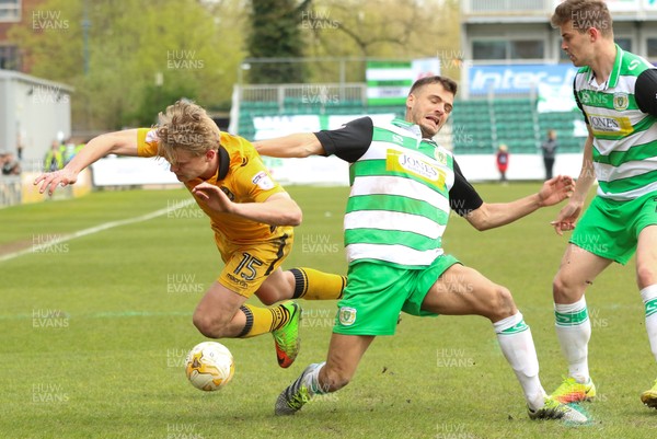 140417 - Newport County v Yeovil Town, Sky Bet League 2 - Alex Samuel of Newport County is brought down by Ryan Dickson of Yeovil