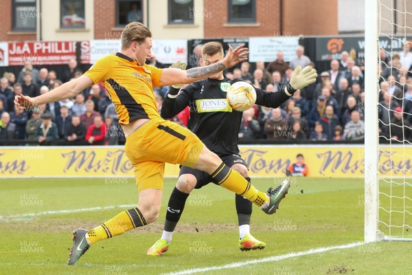 140417 - Newport County v Yeovil Town, Sky Bet League 2 - Ryan Bird of Newport County is closed down by Yeovil goalkeeper John Maddison