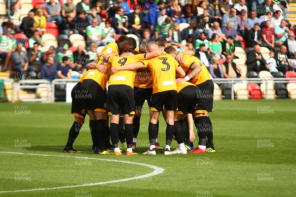 150918 Newport County v Yeovil Town - Sky Bet League 2 -  Players of Newport County huddle before kick off 