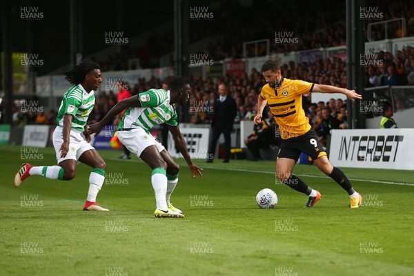 150918 Newport County v Yeovil Town - Sky Bet League 2 -  Padraig Amond of Newport County takes on Sessi Dalmeida and Bevis Mugabi of Yeovil Town 
