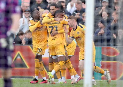 171026 - Newport County v York City, SkyBet League Two - Kion Etete of Newport County celebrates scoring a goal with team mates
