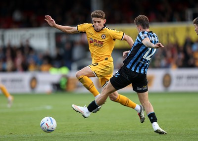 171026 - Newport County v York City, SkyBet League Two - Harrison Biggins of Newport County is tackled by Harry Boyes of York City 