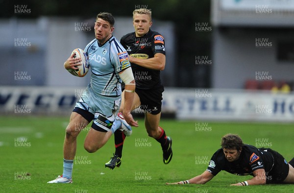 150912 - Newport-Gwent Dragons v Cardiff Blues - RaboDirect PRO12 -Alex Cuthbert of Cardiff Blues tries to get past Steffan Jones of Newport-Gwent Dragons