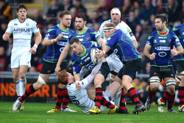 271215 - Newport Gwent Dragons v Cardiff Blues - Guinness PRO12 -Dorian Jones of Newport Gwent Dragons is tackled by Rhys Patchell of Cardiff Blues