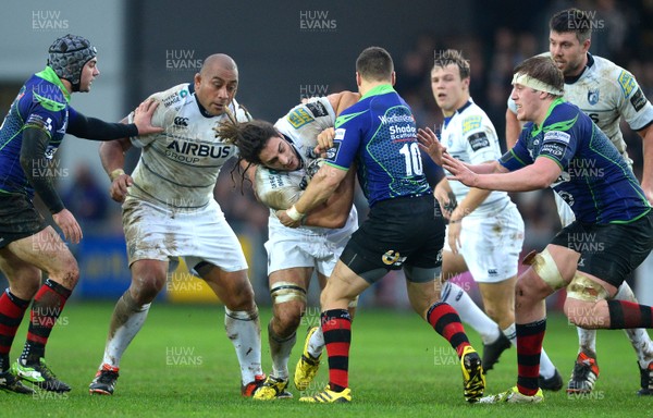 271215 - Newport Gwent Dragons v Cardiff Blues - Guinness PRO12 -Josh Navidi of Cardiff Blues is tackled by Dorian Jones of Newport Gwent Dragons