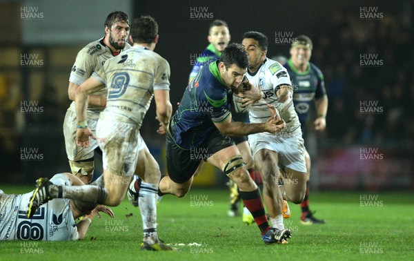 271215 - Newport Gwent Dragons v Cardiff Blues - Guinness PRO12 -Nick Crosswell of Newport Gwent Dragons is tackled by Rey Lee-Lo of Cardiff Blues