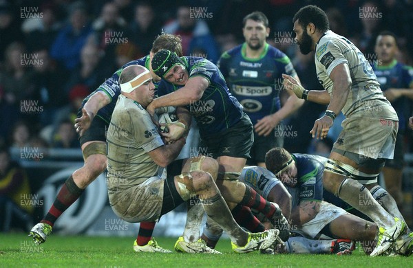 271215 - Newport Gwent Dragons v Cardiff Blues - Guinness PRO12 -Lou Reed of Cardiff Blues is tackled by Nic Cudd of Newport Gwent Dragons