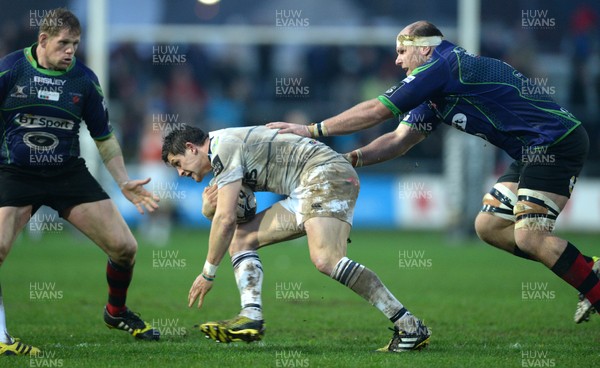 271215 - Newport Gwent Dragons v Cardiff Blues - Guinness PRO12 -Lloyd Williams of Cardiff Blues is tackled by Rynard Landman of Newport Gwent Dragons