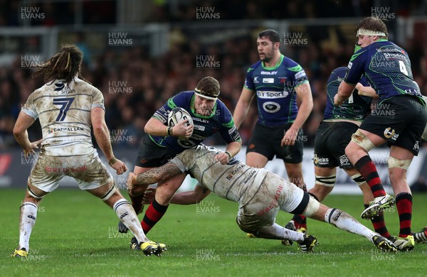 271215 - Newport Gwent Dragons v Cardiff Blues - Guinness PRO12 - Phil Price of Newport Gwent Dragons is tackled by Josh Turnbull of Cardiff Blues