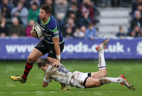 271215 - Newport Gwent Dragons v Cardiff Blues - Guinness PRO12 - Carl Meyer of Newport Gwent Dragons is tackled by Garyn Smith of Cardiff Blues