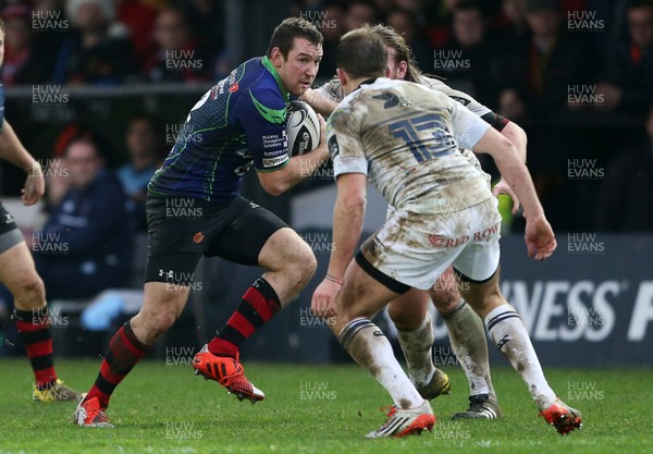 271215 - Newport Gwent Dragons v Cardiff Blues - Guinness PRO12 - Adam Warren of Newport Gwent Dragons takes on Garyn Smith of Cardiff Blues