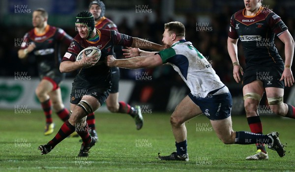 110216 - Newport Gwent Dragons v Connacht - Guinness PRO12 - Nic Cudd of Newport Gwent Dragons is tackled by Tom McCartney of Connacht