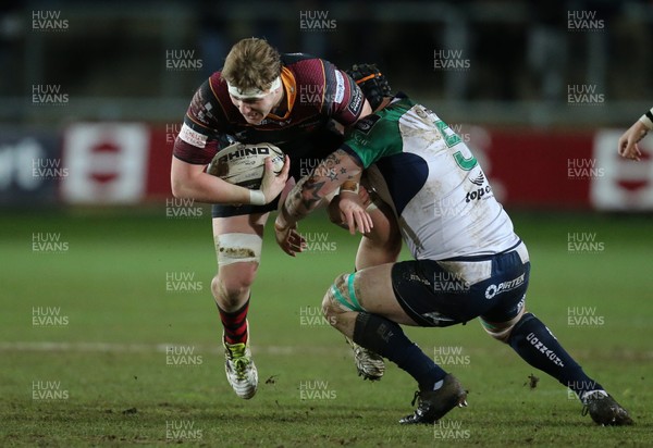 110216 - Newport Gwent Dragons v Connacht, Guinness PRO12 - Matthew Screech of Newport Gwent Dragons takes on Aly Muldowney of Connacht